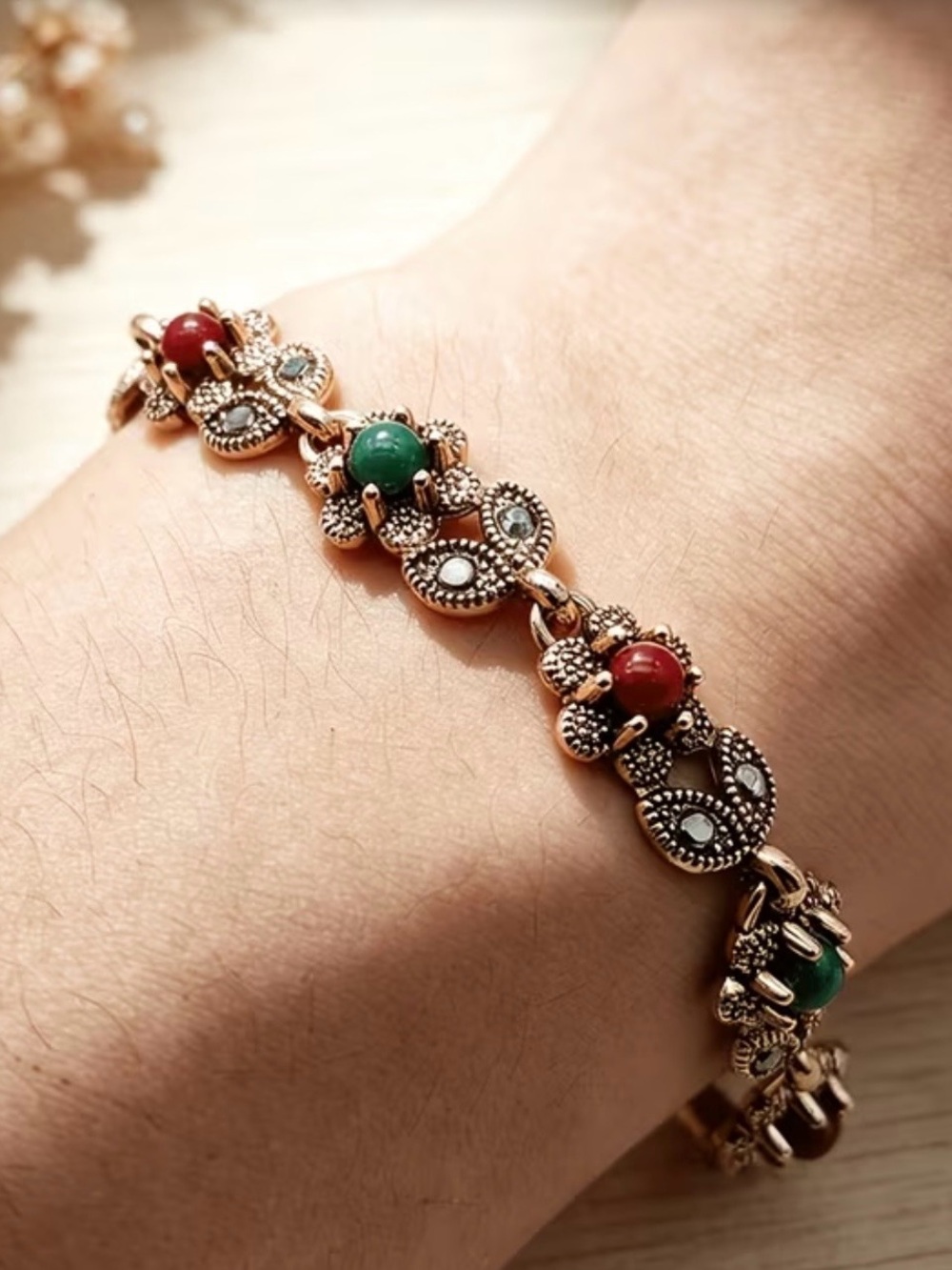 Vintage-Style Rose Gold Bracelet with Red and Green Beads